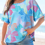 Haut ample à manches courtes et col ras du cou gaufré bleu ciel à imprimé nœud papillon