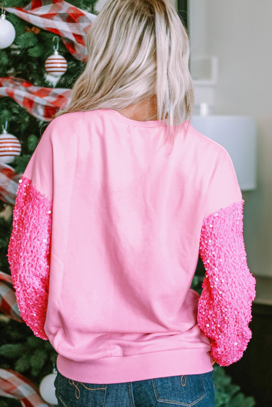 Haut à manches longues rose brillant à paillettes avec motif Père Noël