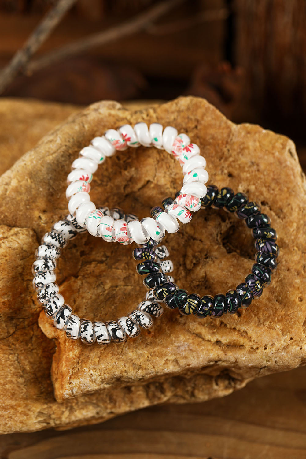 Chouchou noir à motif floral pour cordon de téléphone