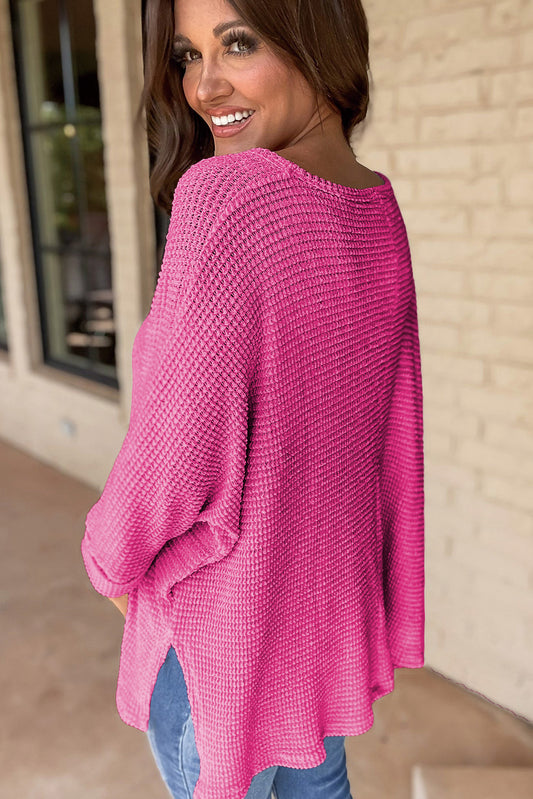 Haut ample en tricot gaufré rouge rose avec fentes latérales et col en V