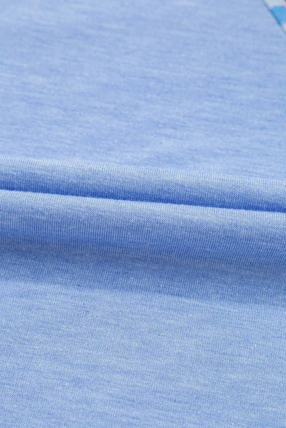 T-shirt grande taille bleu ciel à imprimé léopard et patch colorblock