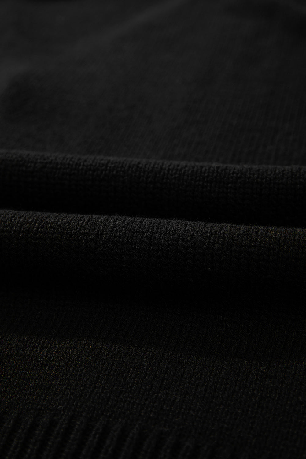 Cardigan noir en maille ouverte à épaules tombantes