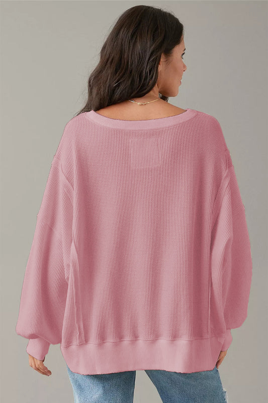 Sweat-shirt surdimensionné fendu à manches évasées en tricot gaufré rose