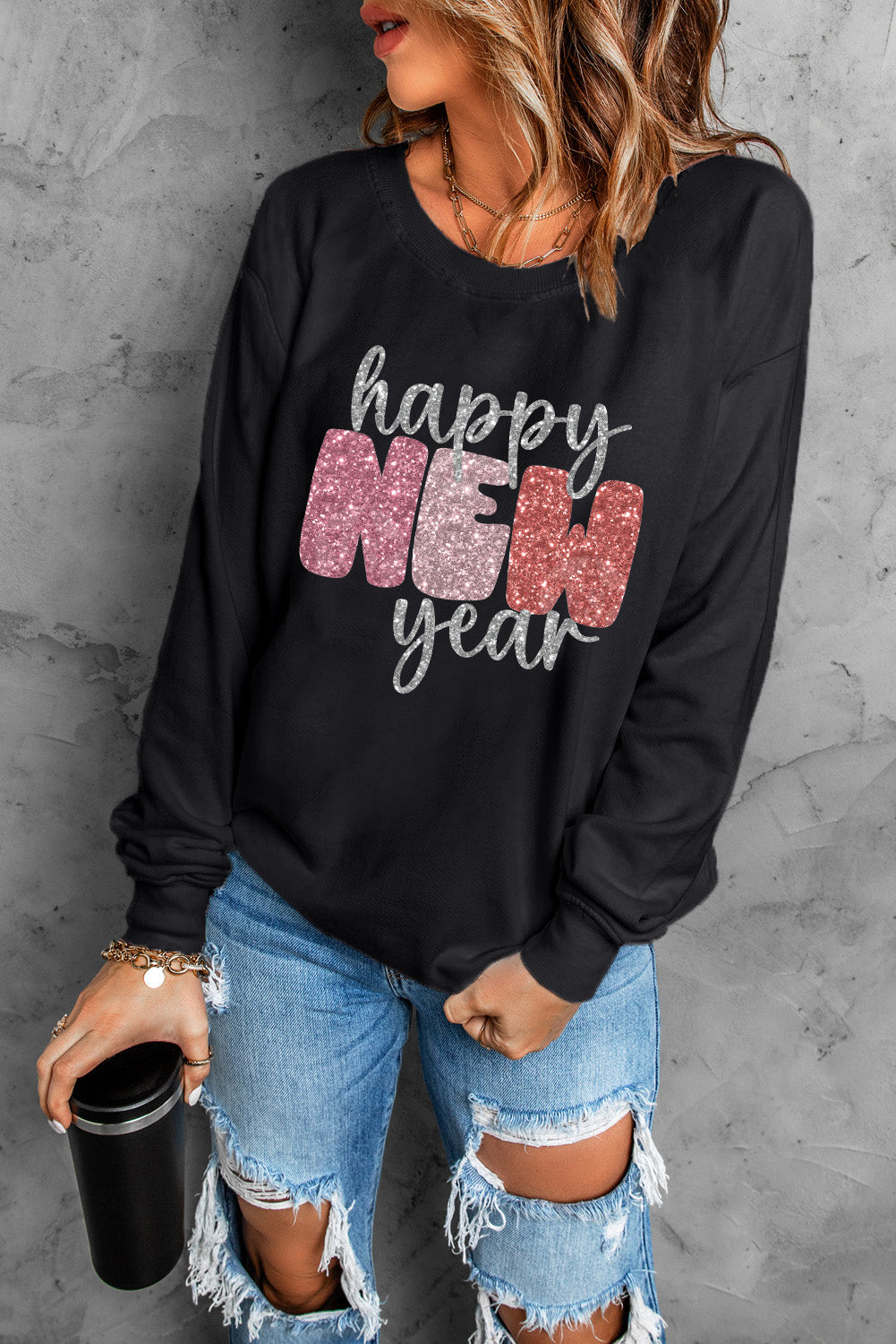 Sweat-shirt graphique noir scintillant « Bonne année »