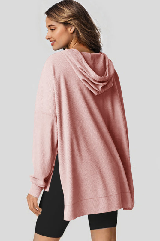Sweat à capuche surdimensionné rose clair en tricot gaufré doublé polaire à col montant