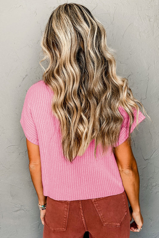 Pull à manches courtes en maille côtelée rose avec poches plaquées