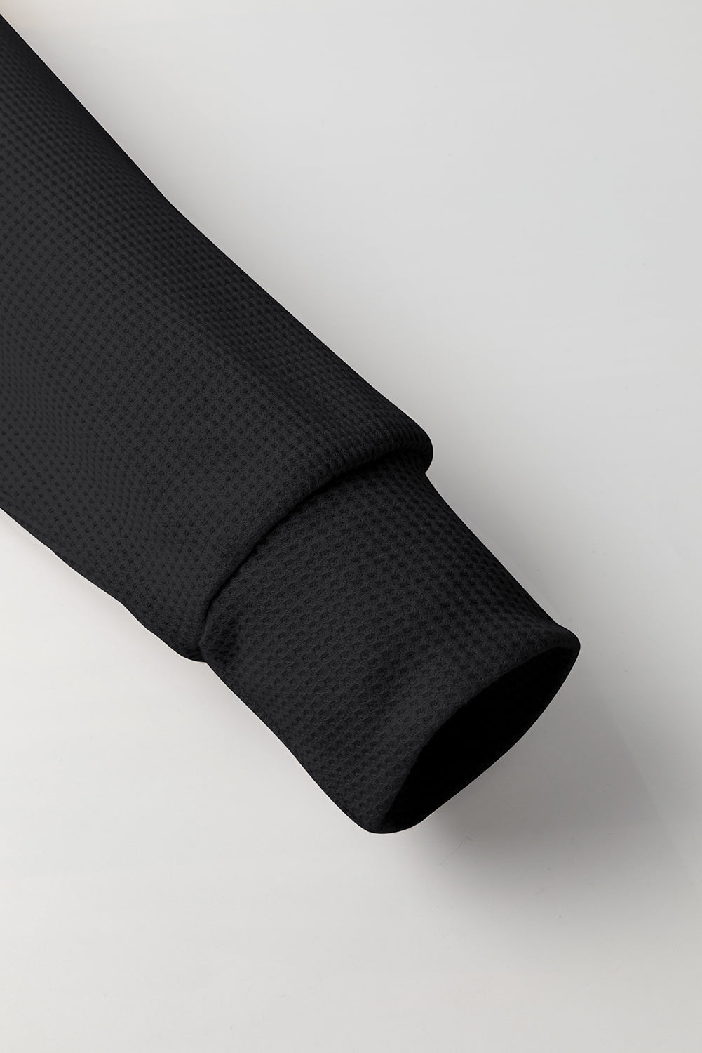 Sweat à capuche surdimensionné noir en tricot gaufré doublé polaire