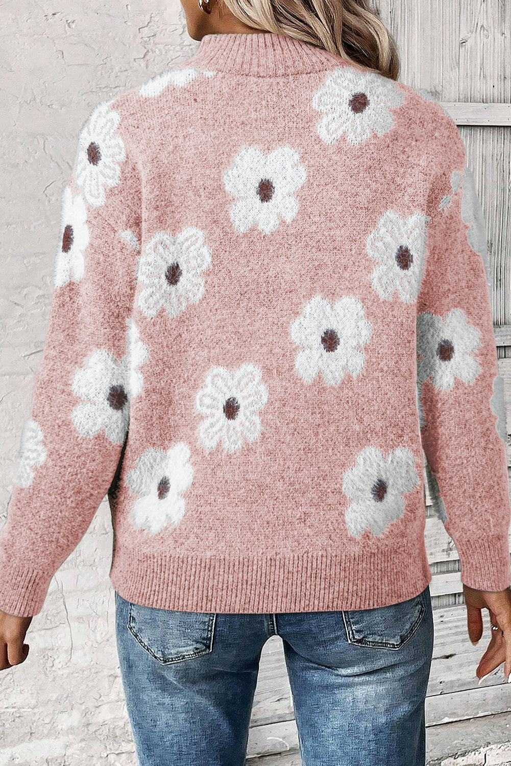 Pull rose à motif floral et demi-zip à épaules tombantes