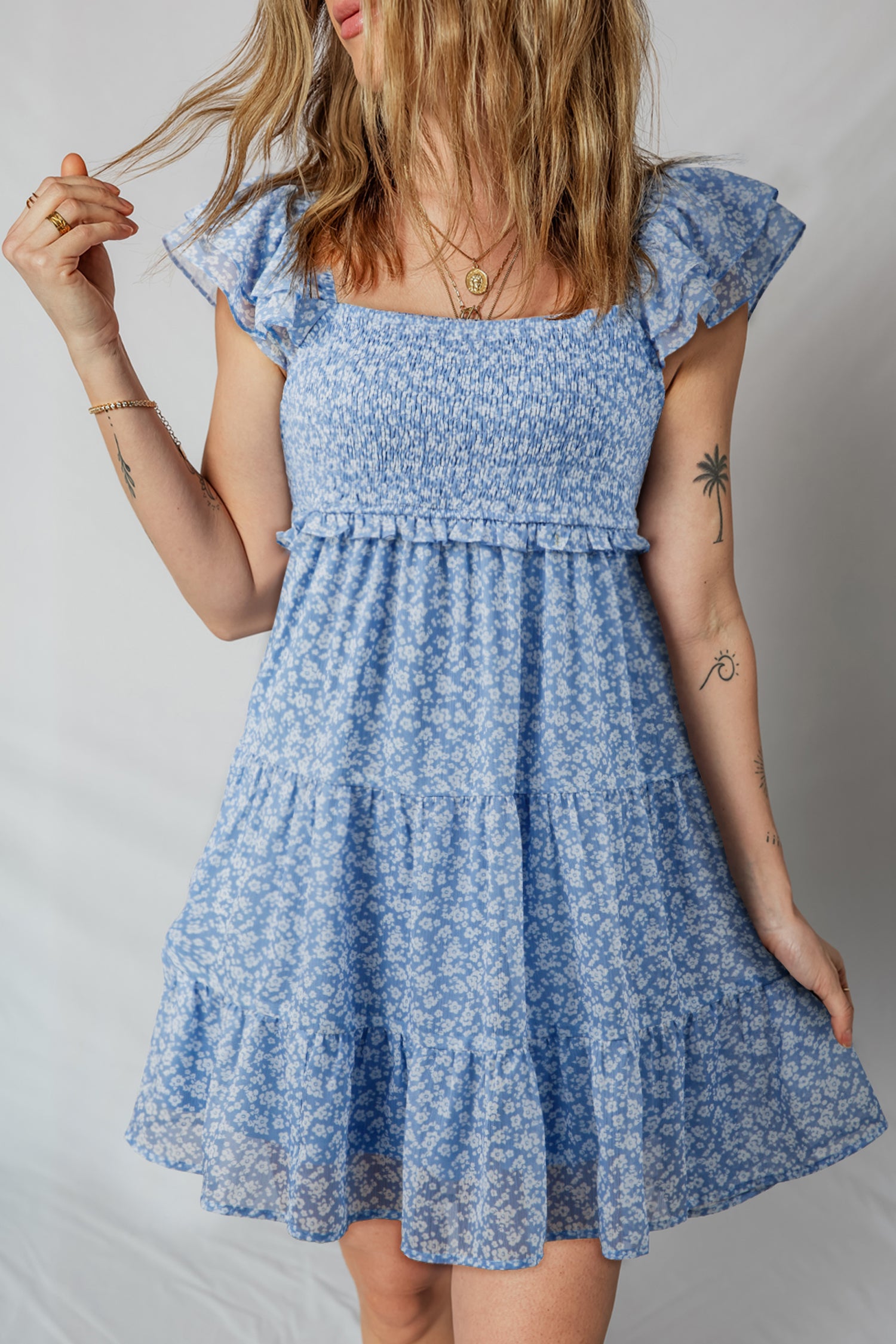 Sky Blue Floral Print Square Neck Flutter Sleeve Smocked Tiered Mini Dress Sky Blue / L / 100%Polyester