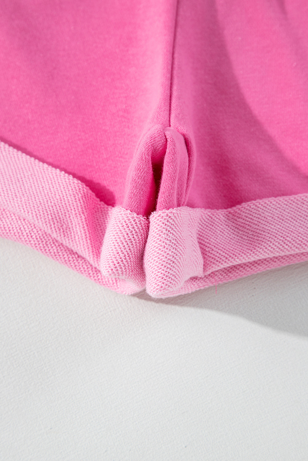 Ensemble haut à manches longues et short rose à imprimé patchwork