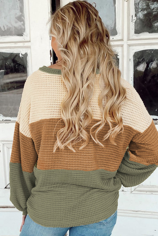 Haut ample à rayures vertes texturées et blocs de couleurs à manches bouffantes