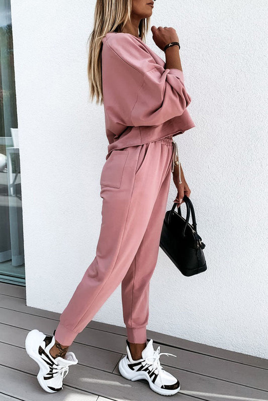 Ensemble pull et pantalon rose uni coupe boxy sport