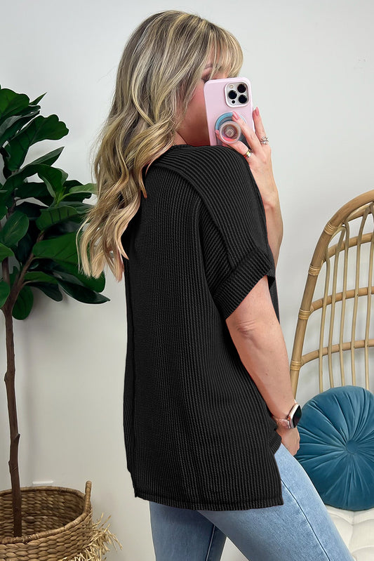 T-shirt en tricot texturé noir à coutures apparentes