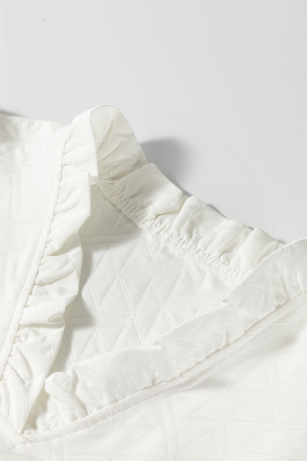 White Geometric Textured Short Sleeve Frilly V Neck Blouse