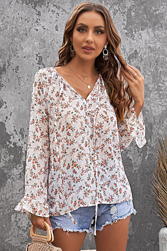 Blusa de manga larga con cordón y estampado floral