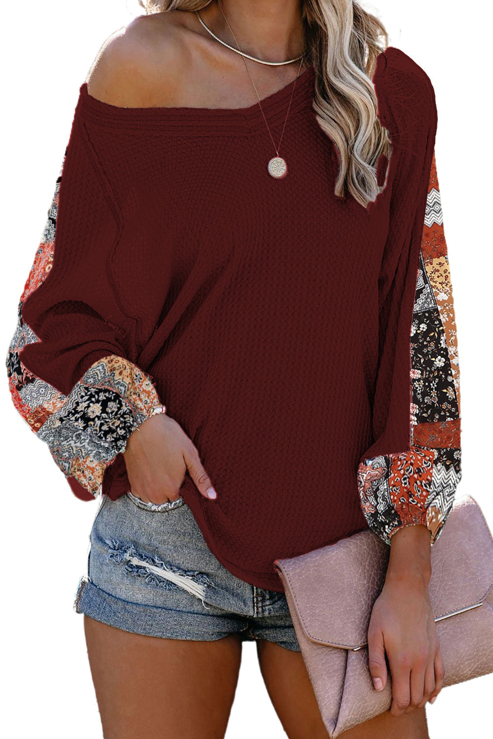 Blusa de punto gofrado con empalme de leopardo