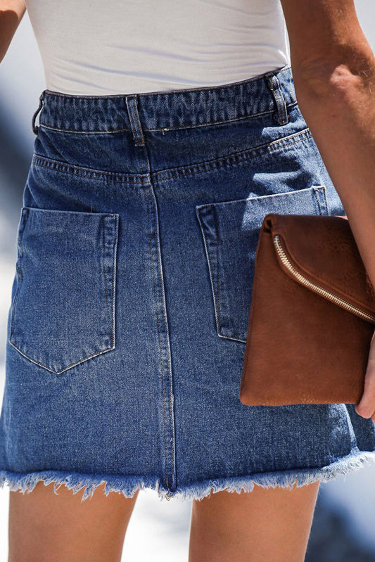 Jupe courte en jean à ourlet brut et poches