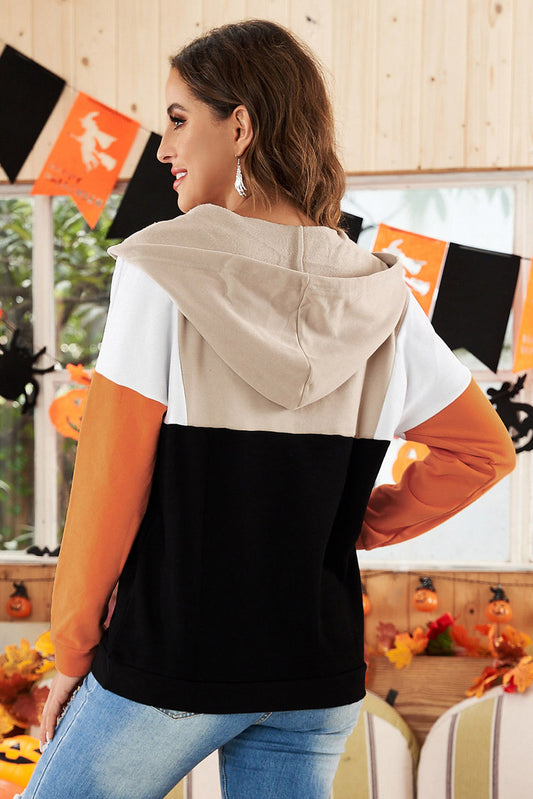 Sudadera con capucha y cremallera de cuarto de color con cara de calabaza de Halloween