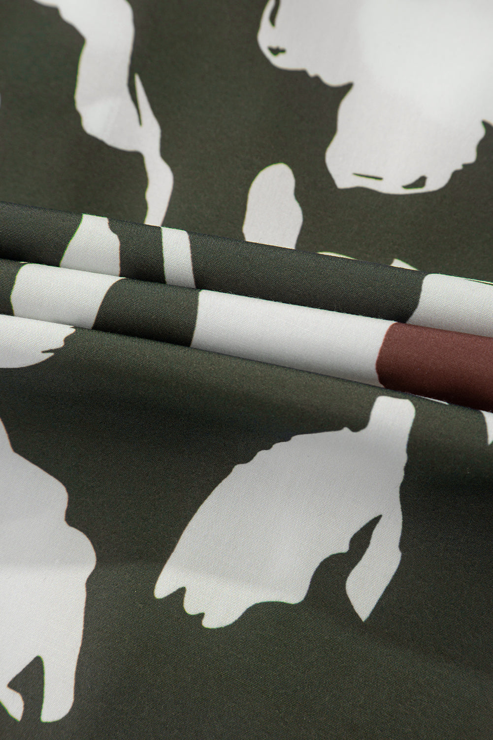 Chemisier à manches bouffantes et demi-bouton à imprimé floral abstrait trèfle à quatre feuilles