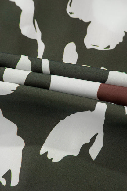 Chemisier à manches bouffantes et demi-bouton à imprimé floral abstrait trèfle à quatre feuilles