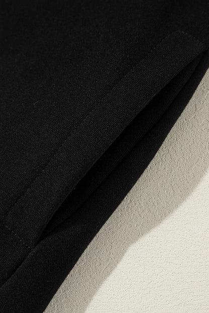 Sweat-shirt noir uni à col rond et ourlet haut-bas