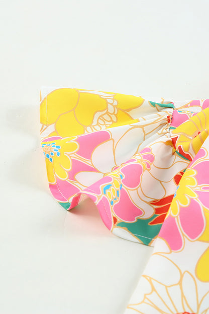 Top floral con mangas acampanadas y cuello levantado multicolor