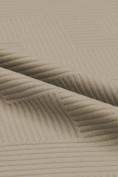 Conjunto de camiseta holgada con textura gris y pantalón con cordón