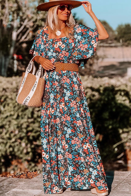 Robe longue bleu ciel à fleurs et col carré noué dans le dos