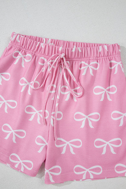 Ensemble t-shirt col V et short en tricot gaufré rose imprimé nœud papillon