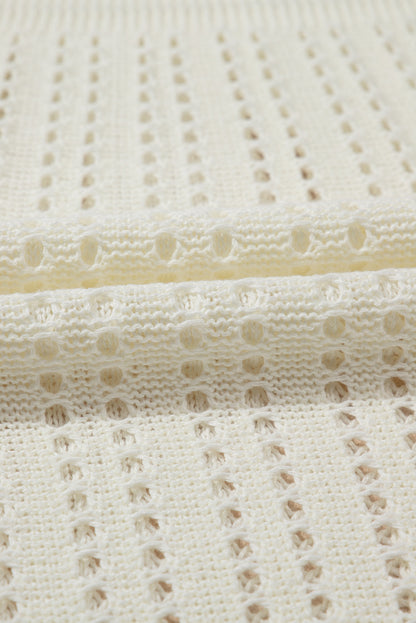 Robe de plage blanche sans manches à col en V et crochet à œillets