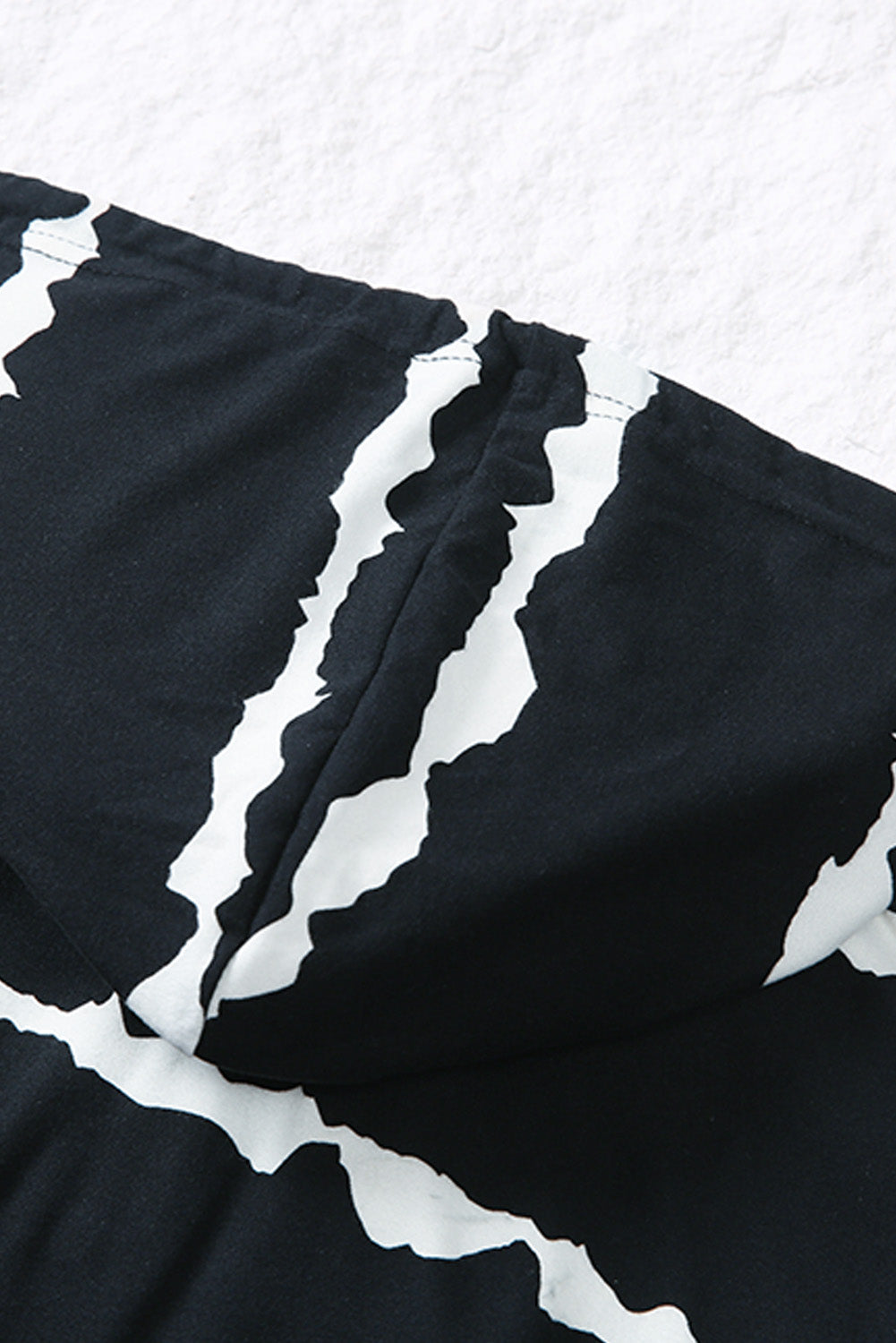 Sudadera con capucha de manga larga con botones y cordón a rayas