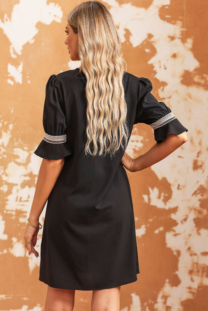 Chemisier à manches courtes et col en V avec bordure en dentelle