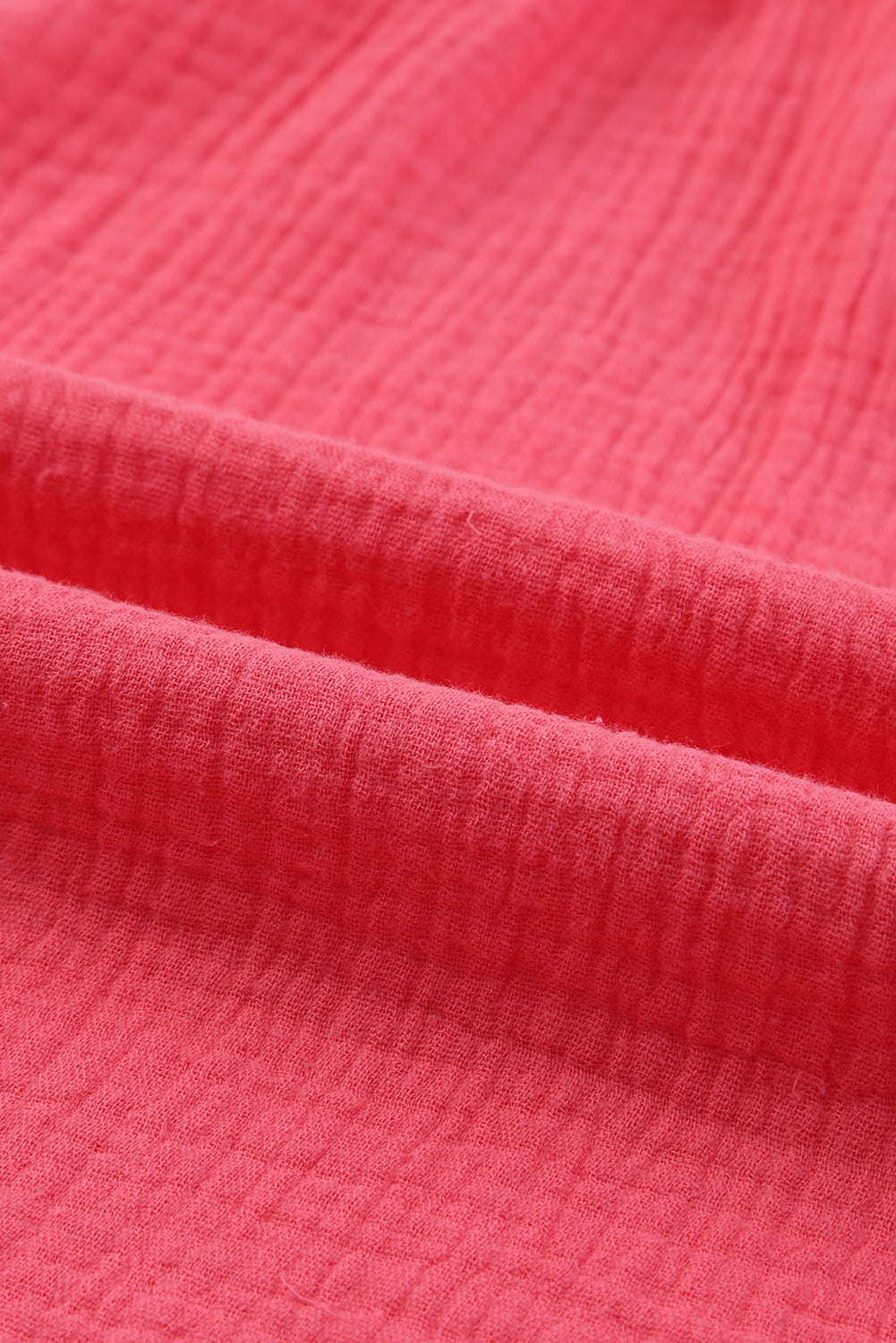 Chemisier texturé à manches flottantes et col à volants 