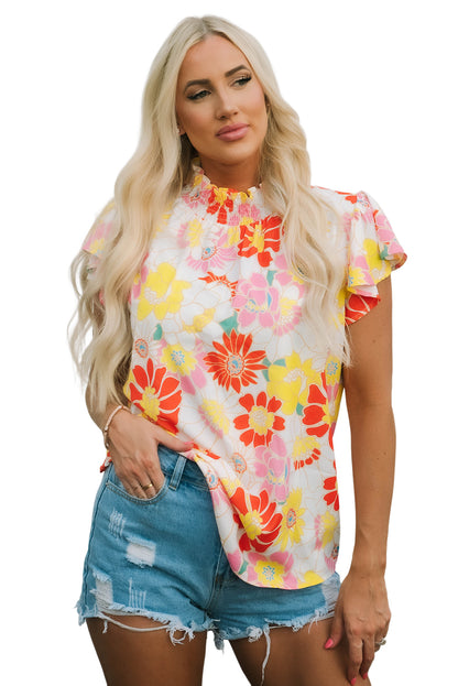 Top floral con mangas acampanadas y cuello levantado multicolor