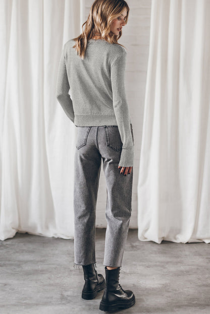 Pull gris uni à manches passe-pouce et bords côtelés