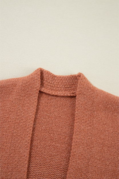 Cardigan court ouvert sur le devant beige clair à épaules tombantes