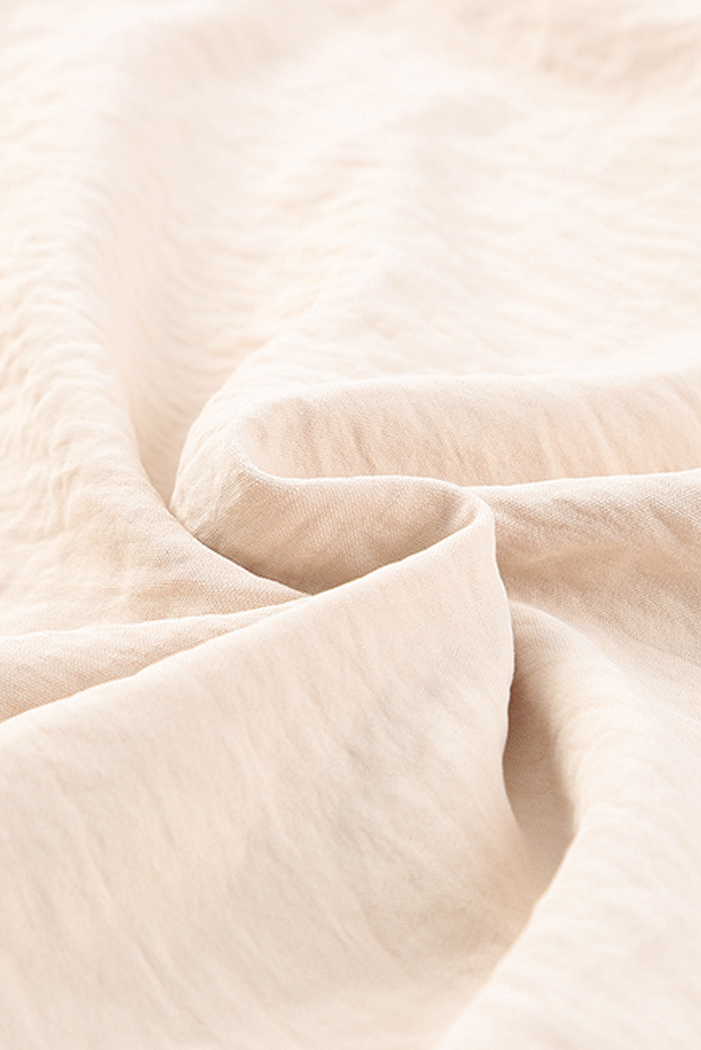 Gilet à col en V et épaules nouées 