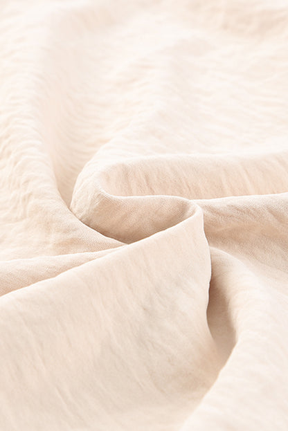 Gilet à col en V et épaules nouées 