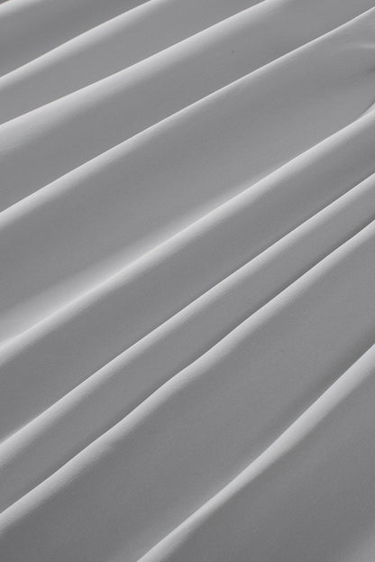 Chemisier à manches cloche et empiècements en crochet