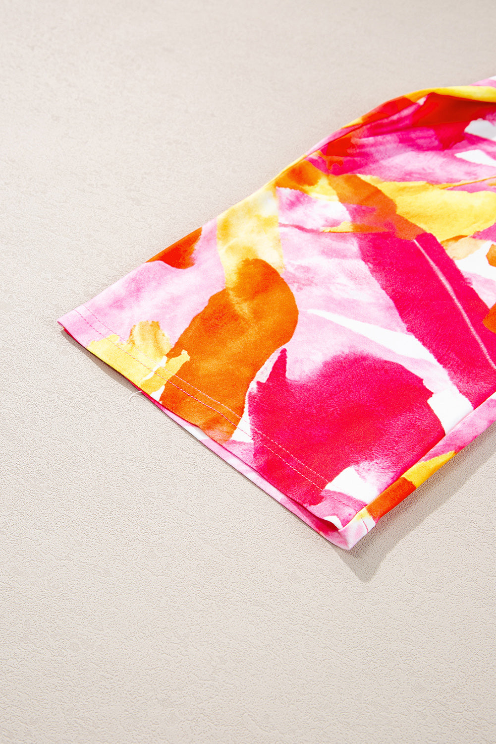 Chemisier babydoll orange à imprimé abstrait, manches 3/4, col en V et volants