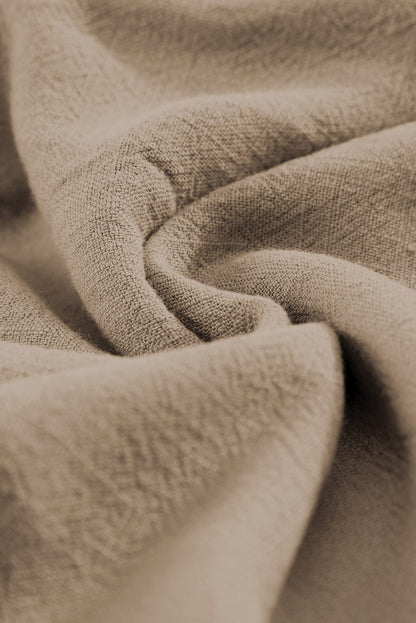 Short kaki taille haute à volants et poches