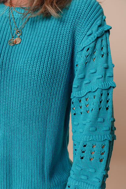 Pull turquoise à volants et manches bouffantes