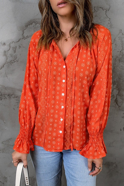 Blusa con botones y cuello en V con estampado floral 