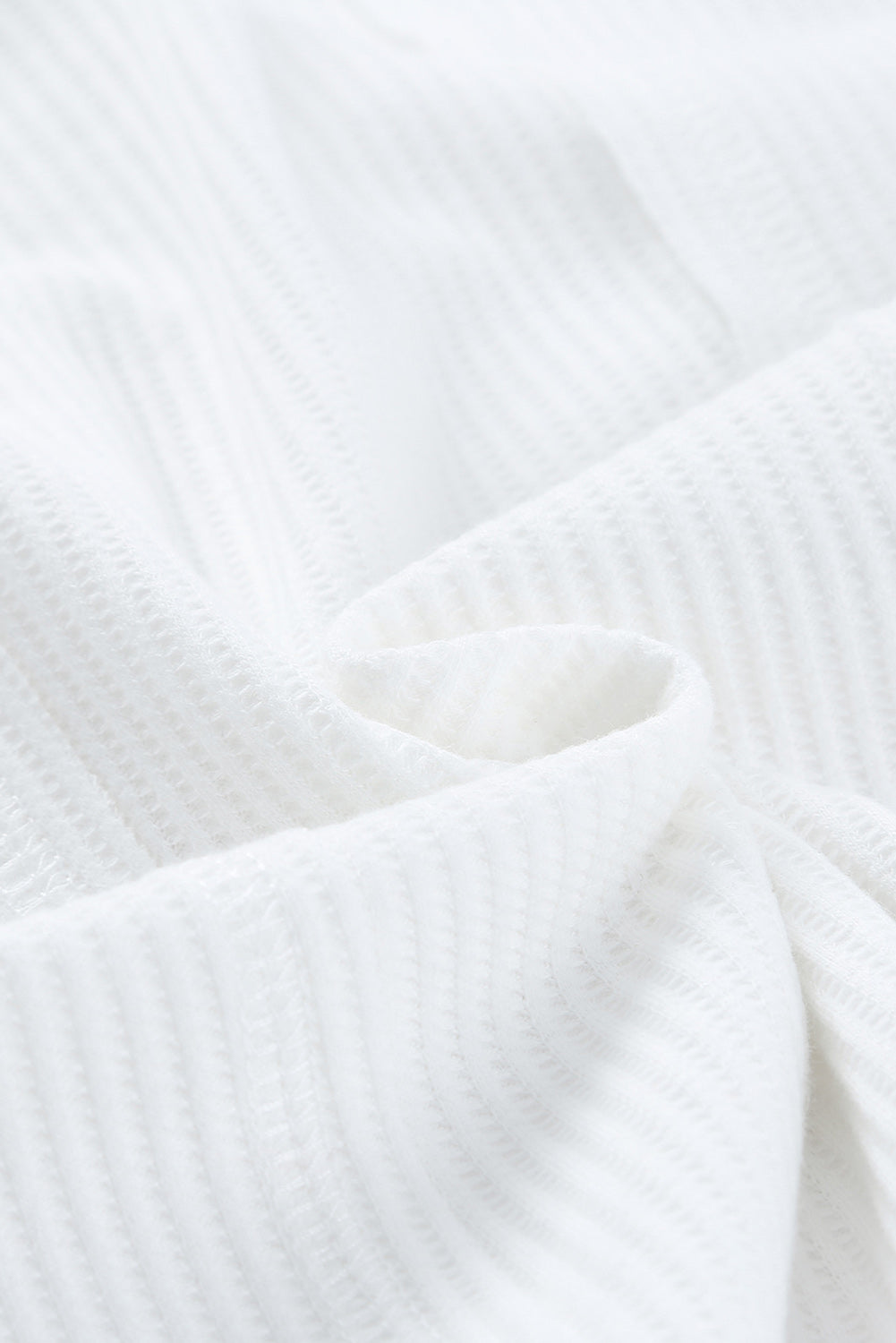 Top henley de punto gofre con medio botón 