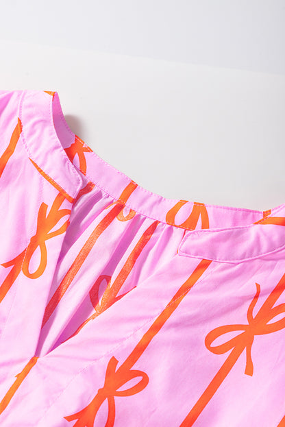 Robe grande taille à volants et taille cintrée avec nœud rose