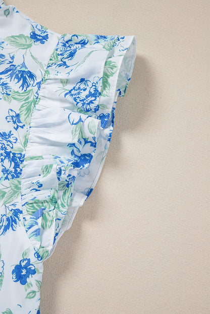 Chemise boutonnée à volants et imprimé floral bleu ciel