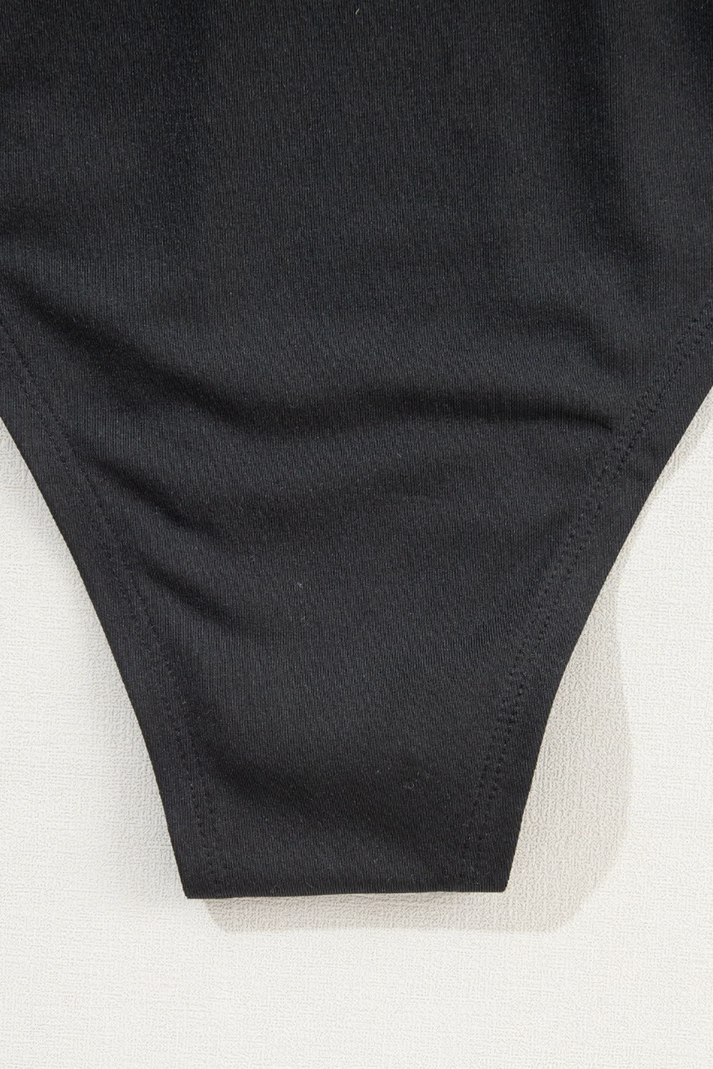 Body à manches longues et col en V en velours noir orné de perles