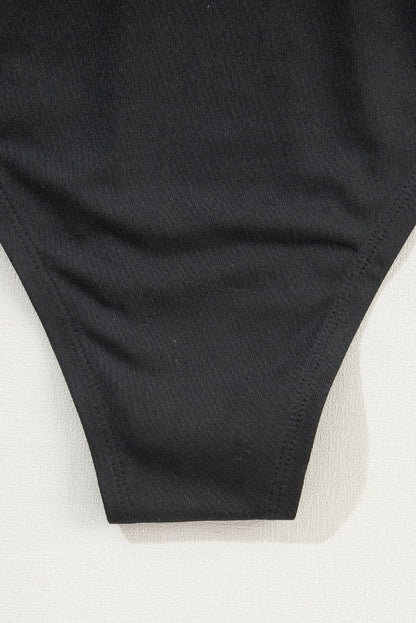 Body à manches longues et col en V en velours noir orné de perles