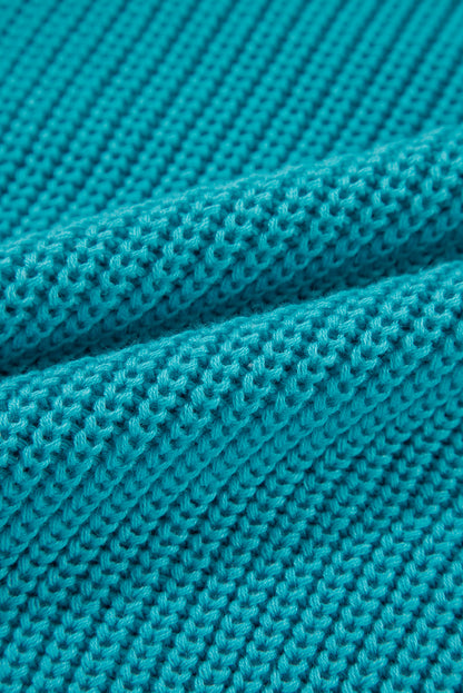 Pull turquoise à volants et manches bouffantes