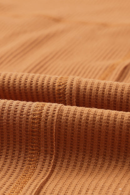 Top henley de punto gofre con medio botón 